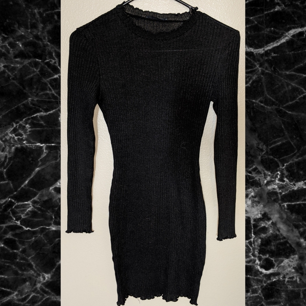 Tight black long sleeve dress